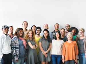 A team of diverse people doing a group photo