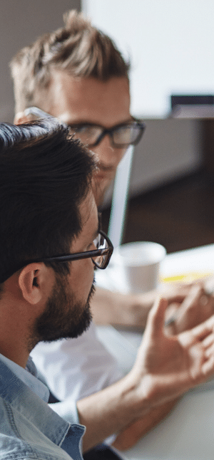 business men sitting at desk over coffee