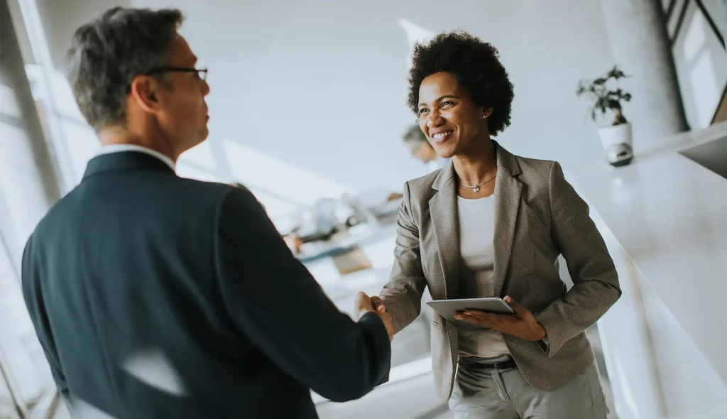 shaking hands in office